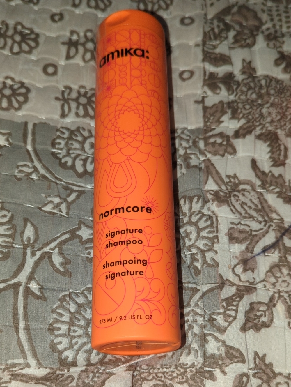 amika bright orange Normcore Signature Shampoo Bottle